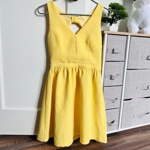Sunny yellow bow back dress